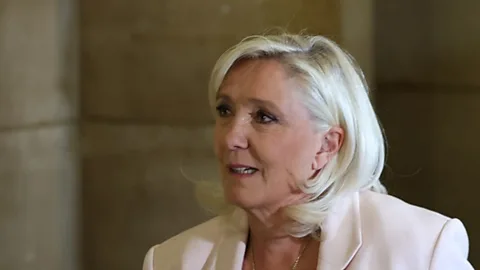 Newshour, Newshour, Paris court upholds Le Pen's embezzlement conviction