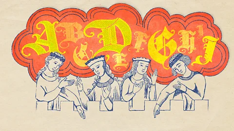 An illustration of four medieval women sat at a table with colourful letters written above them in Old English (Credit: BBC/ Serenity Strull/ Getty Images)
