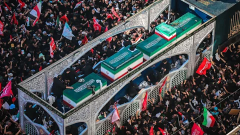 Global News Podcast, US and Iran trade blows as Khamenei is buried