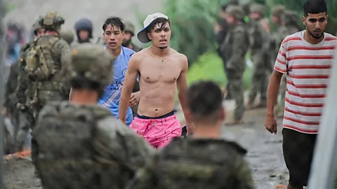 Newshour, Tens of thousands of migrants enter Ceuta
