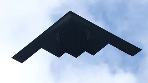 Getty Images A stealth bomber airplane flies over the parade route during the 124th Rose Parade on 1 January in Pasadena, California. (Copyright: Getty Images)