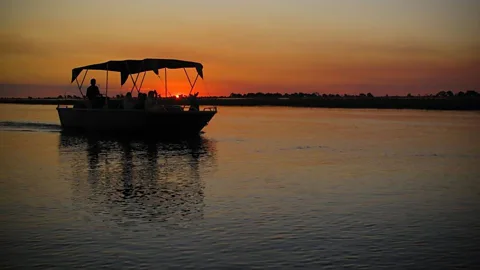 The sun sets in the floodplains. (Colleen Clark) _____________________________________________________________________________________ **[Related article: Safari by water in southern Africa](http://www.bbc.com/travel/feature/20110719-safari-by-water-in-southern-africa)**