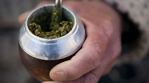 Mate is served in a round, uncovered gourd that is often burnished with metal detailing.(Viviane Ponti/LPI)