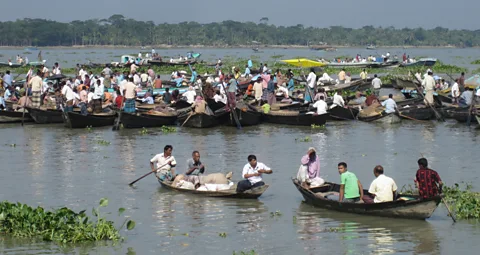 This floating market in southern Bangladesh is where locals come to buy and sell groceries. (Daniel McCrohan)