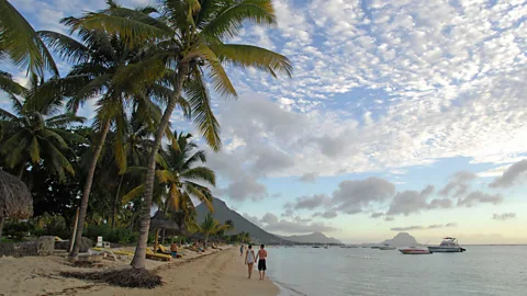 Historic towns and tropical forests await beyond Mauritius' Flic en Flac beach. (BBC)