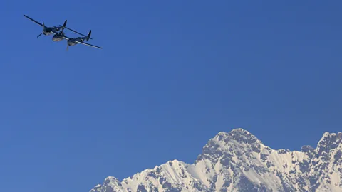 AFP/Getty Images A WWII-era Lockheed P-38 Lightning flies over the Kitzuehel Alps in Austria during an exhibition flight. (Copyright: AFP/Getty Images)