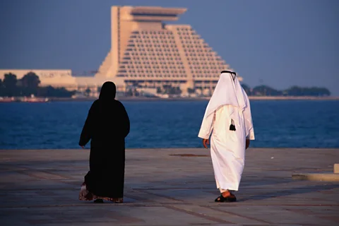 Strolling the bay at dusk is one of Doha's bayside pleasures. (Neil Setchfield/LPI)