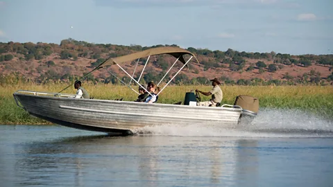 Launch boats ferry guests to land-based safari excursions. (Colleen Clark)