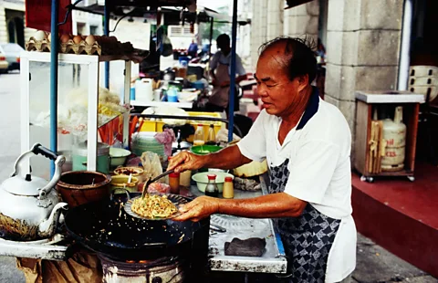Try eating at hawker stalls to sample some of Penangâs finest food. (Richard I'Anson/LPI)