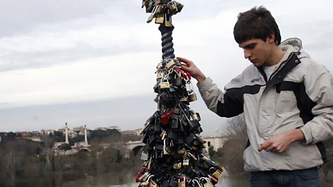 A lamppost covered in padlocks (a symbol of undying love) on Rome's Ponte Milvio Bridge. (Associated Press)
