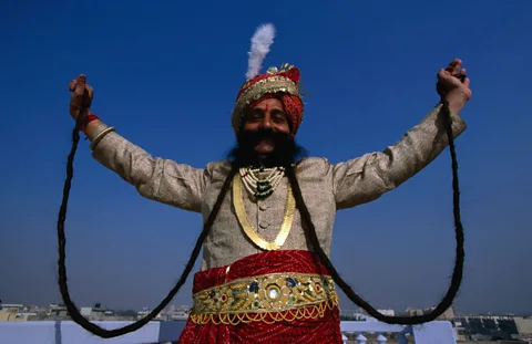 Mr Ram Chauven Singh from Jaipur, proud owner of a 8.5 foot moustache. (Patrick Horton/LPI)