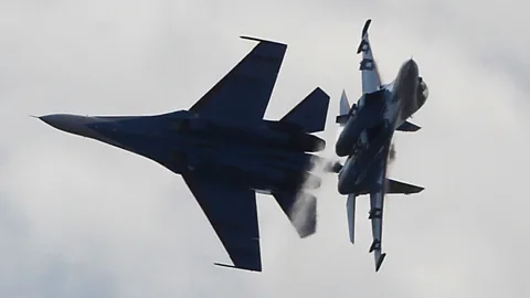 AP Two SU-27 jets from the Russian aerobatics team Russkiye Vityasy (Russian Knights) perform at an air show in St Petersburg (Copyright: AP)