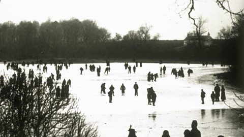 People skating on a frozen pond in Scotland