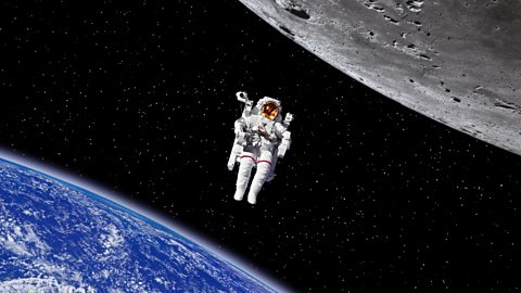 Astronaut wearing space suit floating between Earth and Moon