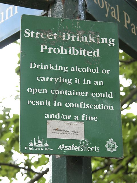 Sign prohibiting drinking in the street