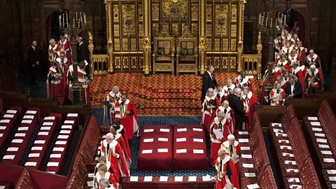 Members of the House of Lords enter the chamber