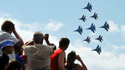 Getty Images Russian SU-27 and Mig-29 combat aircraft perform for the crowd during the International Maritime Defence Show in St Petersberg. (Copyright: Getty Images)