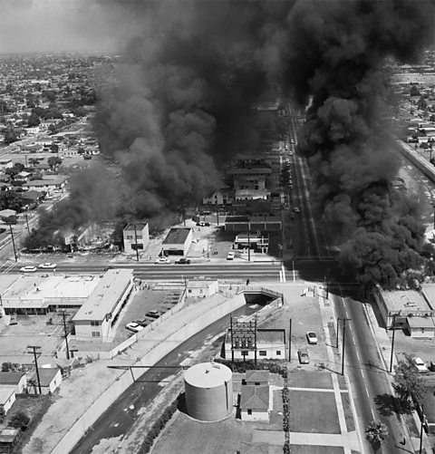 Burning buildings during the Watts riots, August 1965