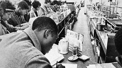 Students stage a sit-in at a canteen