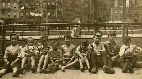 Young boys on a sidewalk of Little Italy in New York 1900