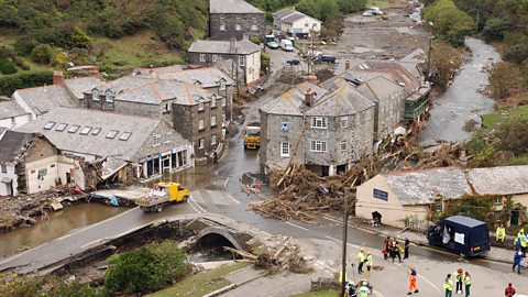 Emergency services survey the flood damage in Boscastle, UK