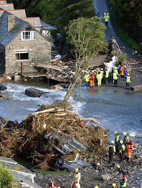 Photograph of Emergency services on the scene of the flooded village of Boscastle