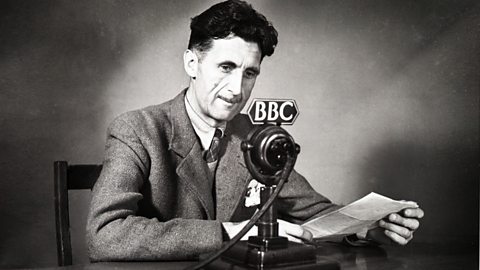 A black and white portrait of George Orwell in front of a BBC microphone