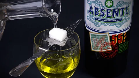 Absinthe, a green liquor known for its hallucinogenic effects and popular with legendary authors and artists, was banned for most of the past century. (Goran Heckler/Alamy)
