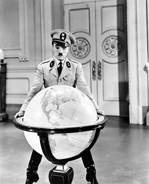 Charlie Chaplin performing in the film The Great Dictator