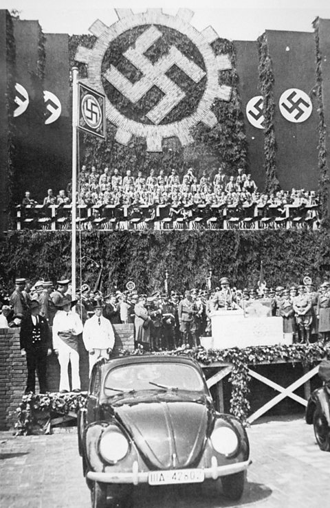 Adolf Hitler launching the “people’s car”, the Volkswagen Beetle   