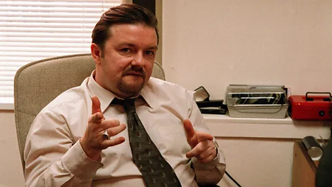 BBC Ricky Gervais stars as inept middle-manager David Brent in the UK version of The Office (Credit: BBC)