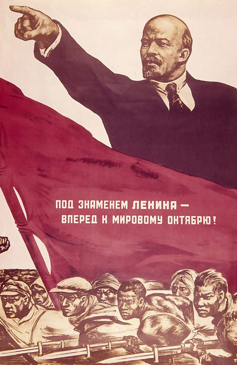 Propaganda poster of Lenin, arm outstretched pointing into the distance. There is a red flag beneath him and group of soldiers with their rifles drawn and bayonets attached.