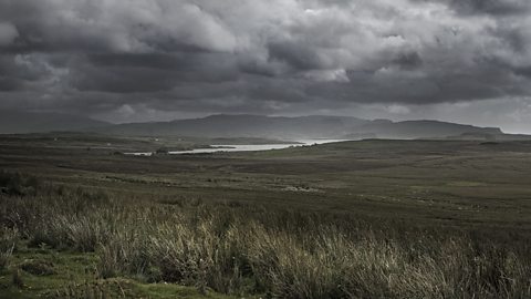 A bleak Scottish landscape with grey skies