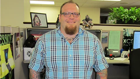 Erik Robertson, a PR account executive, hides his tattoos when meeting with conservative clients. (Courtesy Erik Robertson)