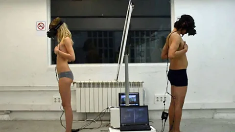 Rikke Frances Wahl (left) swapped bodies with her male partner using virtual reality headsets (Be Another Lab)