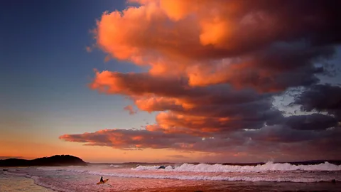 Clouds lit up by the setting sun at Mollymook Beach on the south coast of New South Wales, Australia. (Reuters)