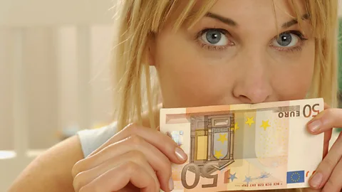 Can money buy happiness? Should salaries stay secret? (Getty Images)