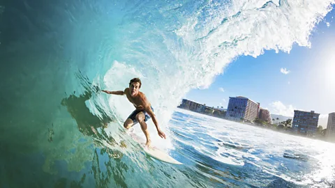 Could pro surfers and other athletes perceive time more slowly than the rest of us? (Thinkstock)