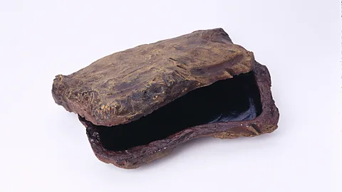 Fake rocks are still used for dead drops to conceal and pass sensitive information (International Spy Museum)