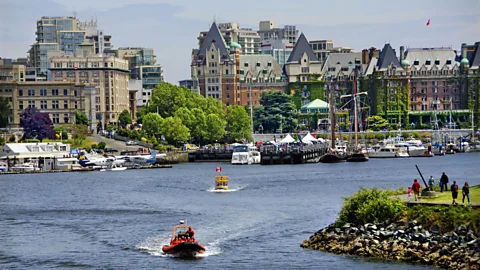 Boats ply Victoria Harbour. (Mitch Diamond/Getty)