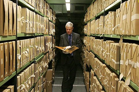 A man exploring an archive.