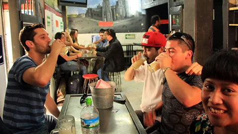 Pulque with friends at La Risa. (Brad Cohen)