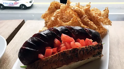 The chili-less half-smoke at Churchkey is marked by its taut snap. (David Farley)