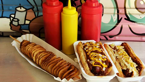 Half-smoke (middle) next to a slaw dog (right). (The Washington Post/Getty)