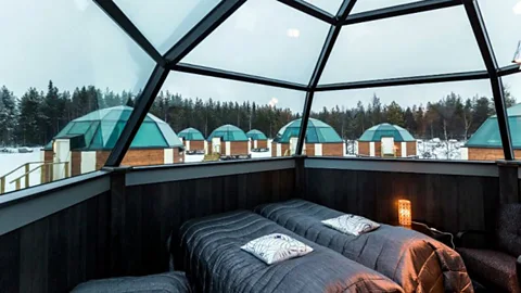 Glass igloos in Lapland, Finland, offer one way to view Northern Lights. (Arctic SnowHotel & Glass Igloos)