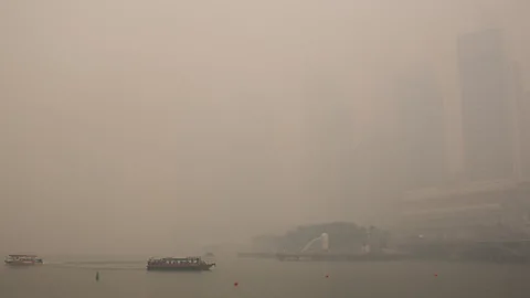 In recent years, Singapore's harbour has been blanketed with pollution during haze episodes (Getty Images)