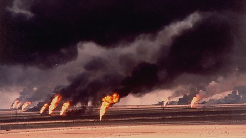 Kuwait's oil fields on fire after retreating Iraqi forces employ a 'scorched earth' policy.