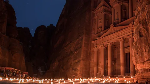 Candles light up the Treasury of Petra, Jordan. (Pete Heck)