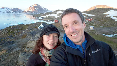 The couple sampling Greenland’s summer sun near the settlement of Kulusuk. (Pete Heck)