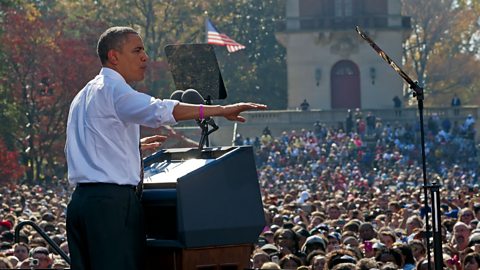 President Obama opening a campaign rally addressing a large crowd